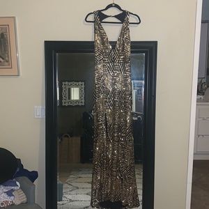Sexy sequin dress. Elegant has a sexy slit.